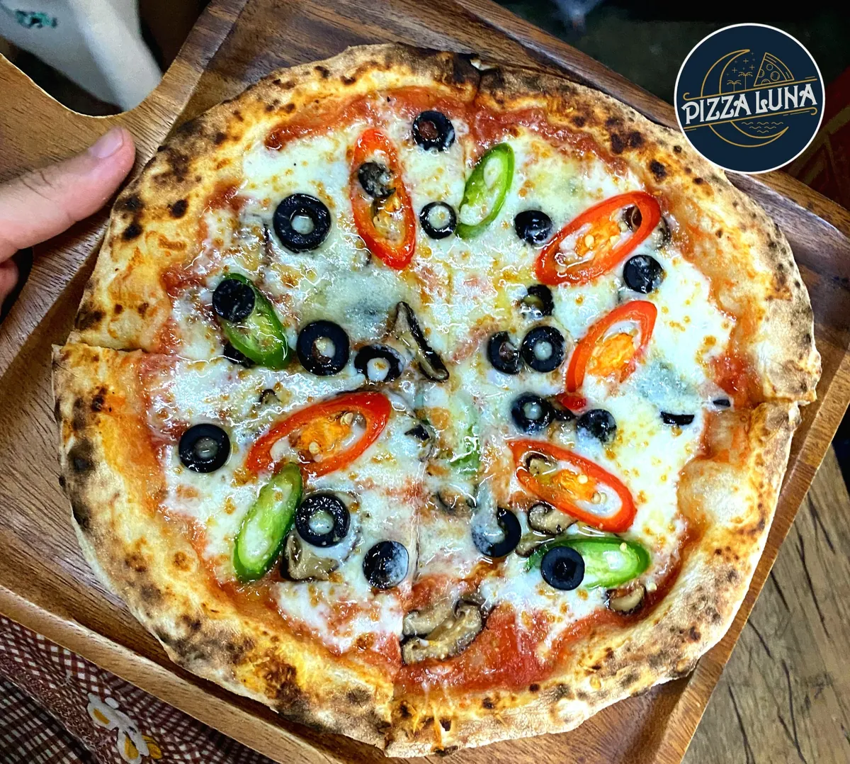 Pizza Luna chili, olive and mushroom pizza